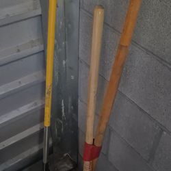 3 gardening rakes