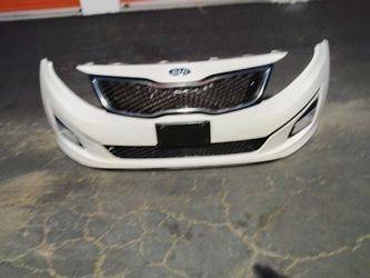 2013-2015 Kia Optima complete front bumper with All the accessories oem.
