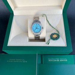 Rolex Oyster Perpetual 31mm stainless steel Tiffany blue dial diamond bezel