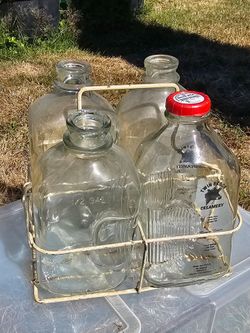 VINTAGE HALF GALLON MILK BOTTLES IN WIRE CARRIER