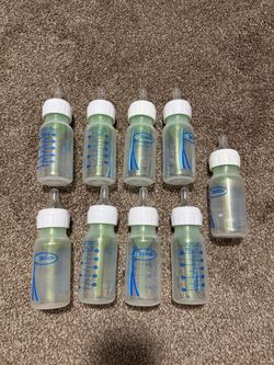9 Dr. Brown's 4 oz Baby Bottles!!