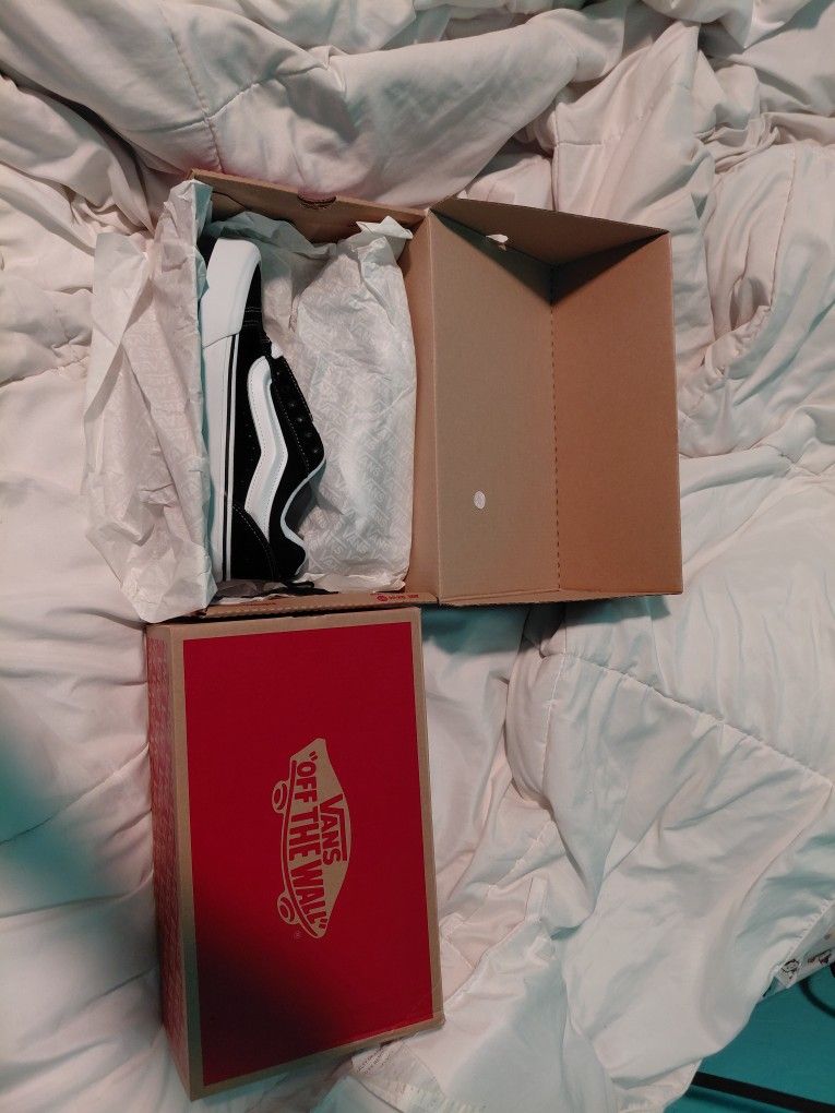 2 Pairs Of Vans