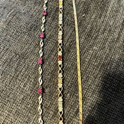 925bracelets two with diamonds and rubies and stones