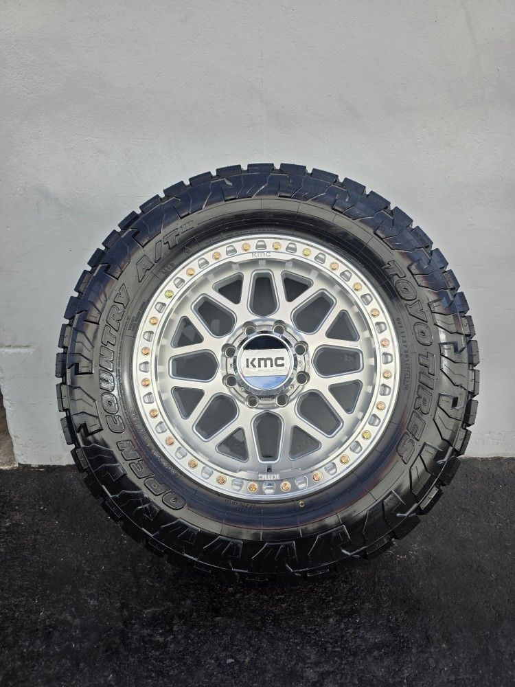 20" KMC rims w- 35" Toyo Open Country AT3 tires