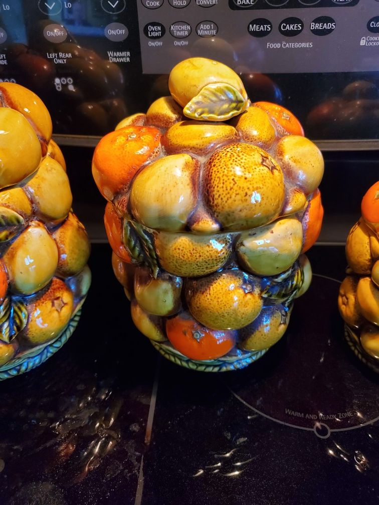 Mid century Inarco orange spice fruit basket 8 piece canister set