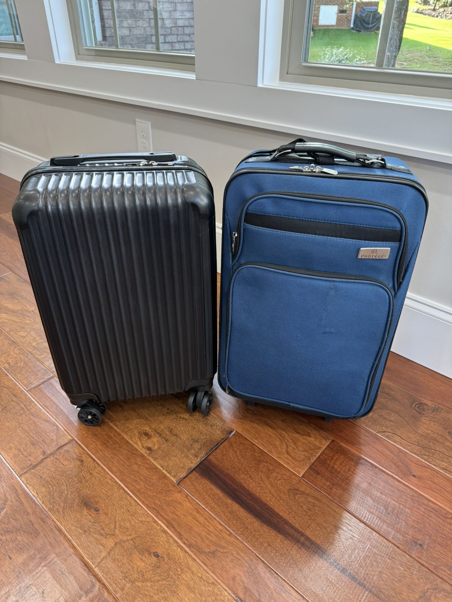 Two carry on suitcases. Only selling them together!
