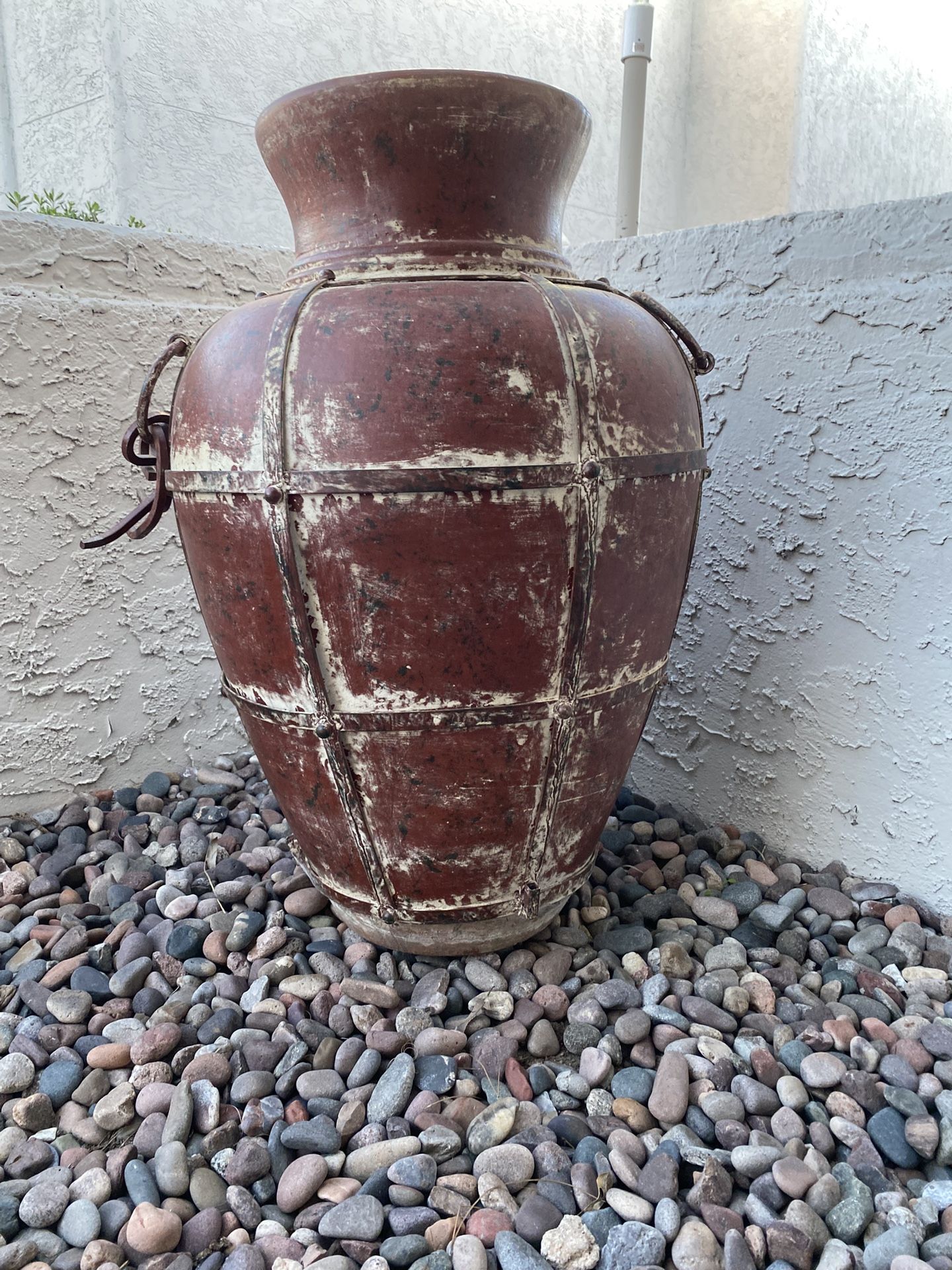Large, Distressed Terracotta Floor Vase With A Metal Grid Covering