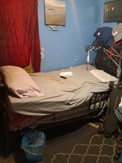 Electric hospital bed with disability jack for lifting people with disabilities that have trouble walking