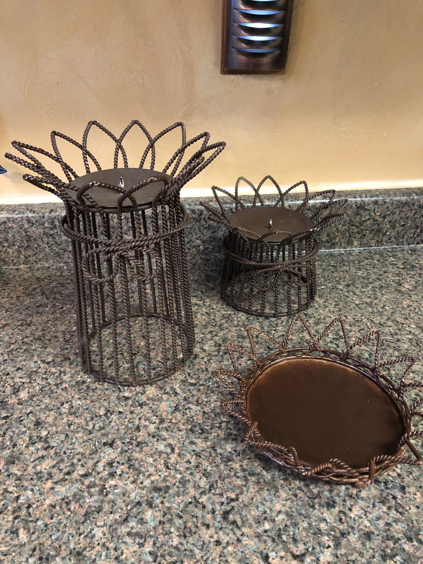 Set of 3 metal candle holders.