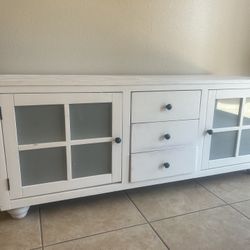 TV Stand  24” High 62” Wide. 22” Deep 