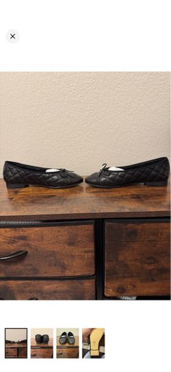 Quilted Black Leather Ballet Flats with Bow Accent