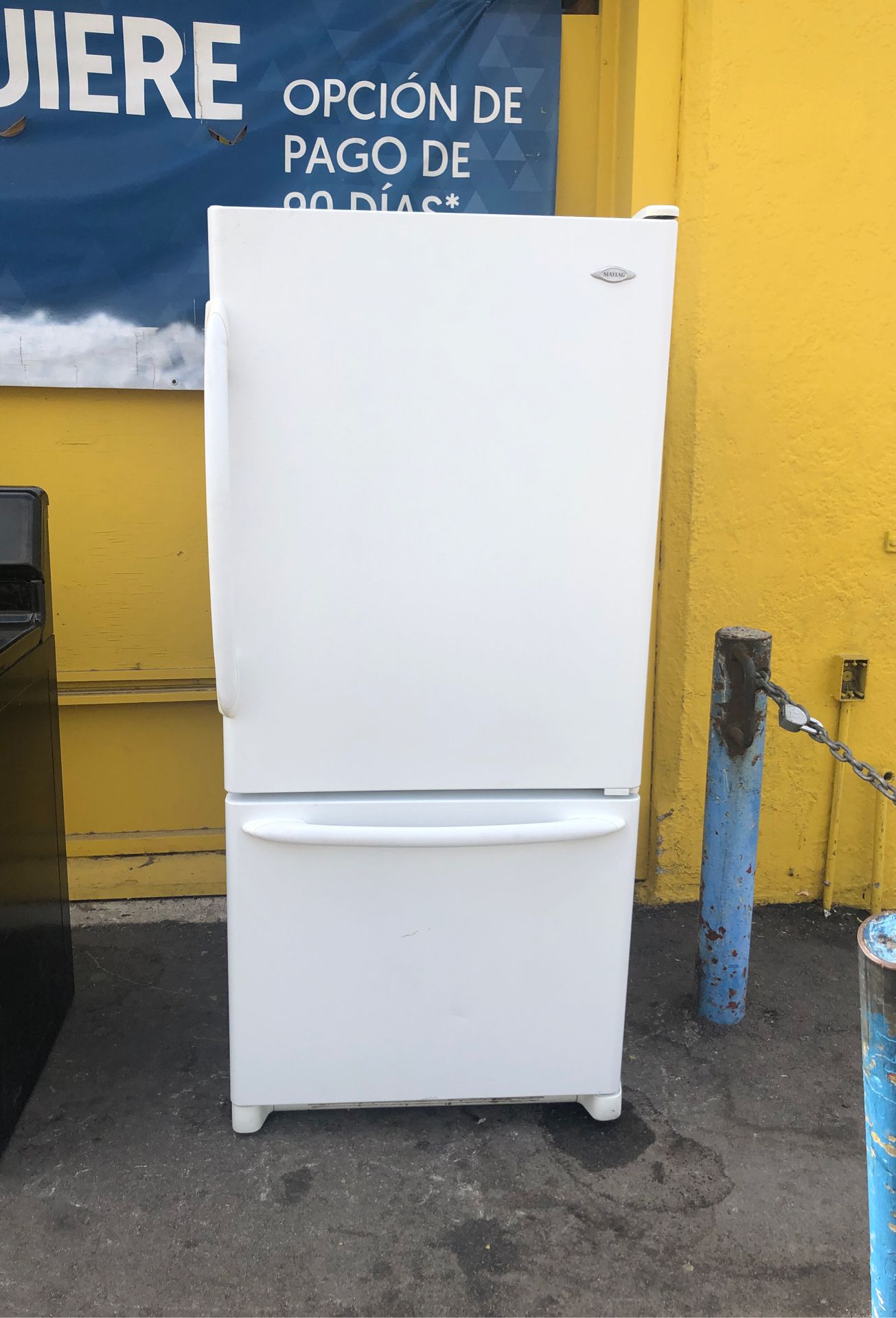 White refrigerator with bottom freezer