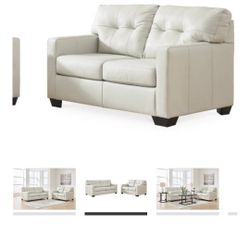 Ashleys Loveseat Brand New And Matching Ottoman 