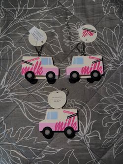 Milk truck hand sanitizer holders
