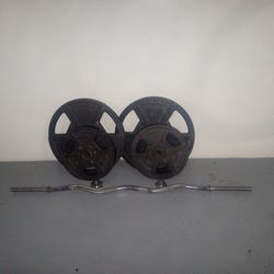 WEIDER Olympic weights (2) 50lbs &25lbs w/ Chrome curling bar.