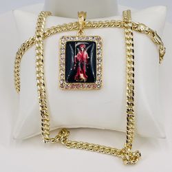 La Santa Muerte y Cadena oró laminado 14k/the grim reaper and 14k gold plated chain