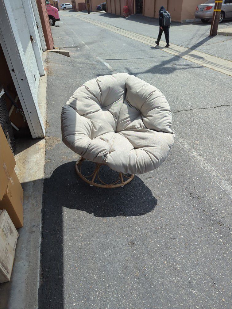 Andrus Outdoor Papasan Swivel Chair with Cushion