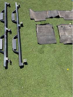 Toyota tacoma door steps & factory all weather floor mats