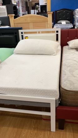Twin white metal bed frame