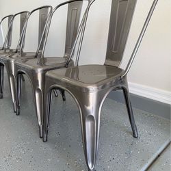 5 metal chairs