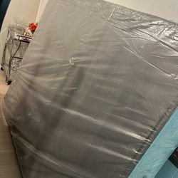 Queen size box spring- still in plastic $40