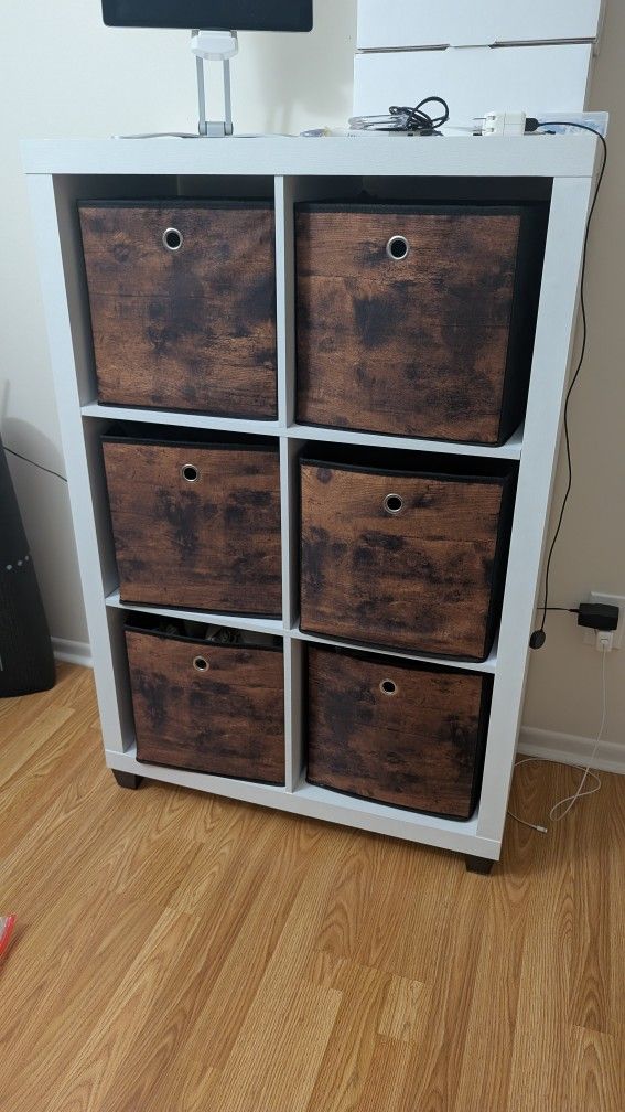 white cube storage shelf unit with six rustic brown fabric storage bins