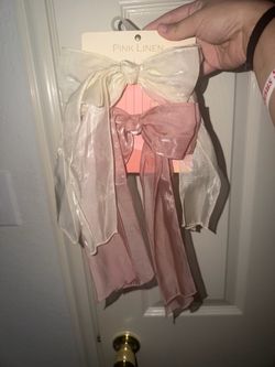 Pink and white bow