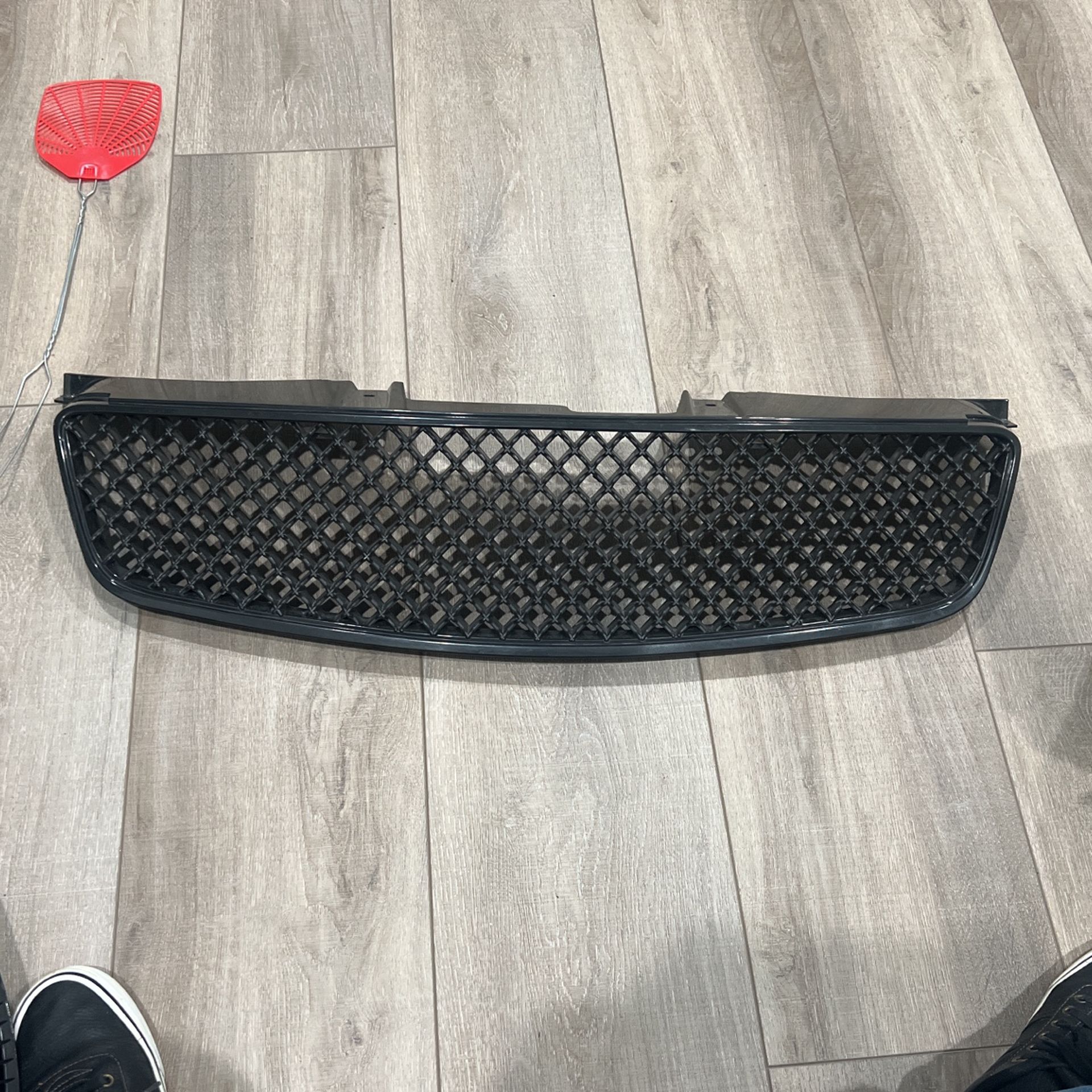 Aftermarket Nissan Ultima grill