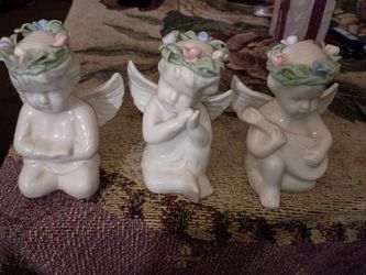 White cherub figurines
