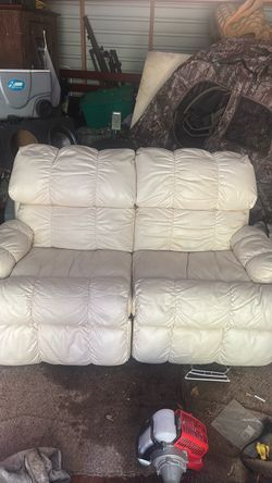 Cream Leather Reclining Loveseat