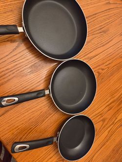 Three frying pans