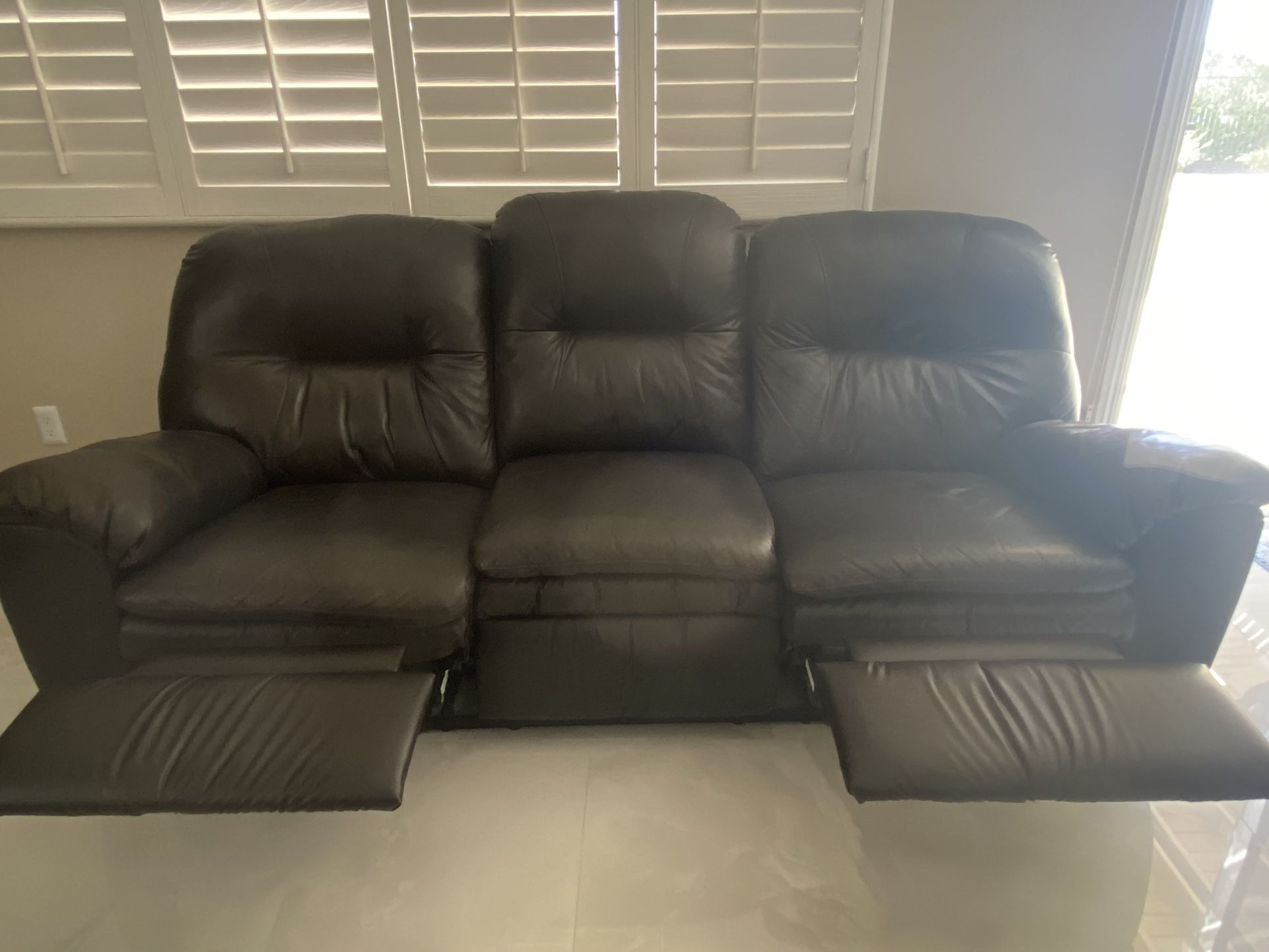 Used Leather reclining Sofa