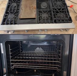 Used Professional Series 48 Inch Wide 6 Burner Gas Rangetop with Griddle + Used Viking Professional double wall oven Combo