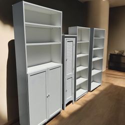 White 7 layer shelf bookcase cabinet $95, bathroom cabinet / pantry cabinet $75, large 5-layer bookcase $75, medium 5-layer bookcase $50