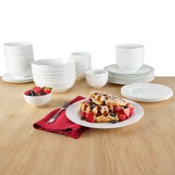 New Mikasa 40-piece Bone China  Set. Sells at costco for $100 + tax