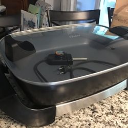 OSTER LARGE ELECTRIC SKILLED WITH HINGED LID. LIKE NEW CONDITION. AMAZON PRICE $79 