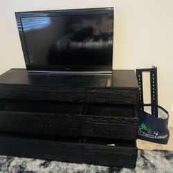 Dresser with a Toshiba TV 