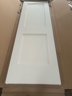 CODEL DOORS 26 in. × 80 in. 2-Panel Solid Wood Core White Primed Smooth MDF Interior Door Slab