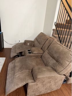 Brown power reclining sofas