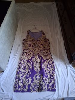 Very nice and elegant , purple and gold dress