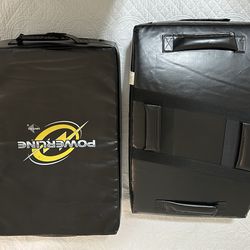 Two hand held punching bags