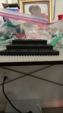 A Lego Holder For Legos To Stand On