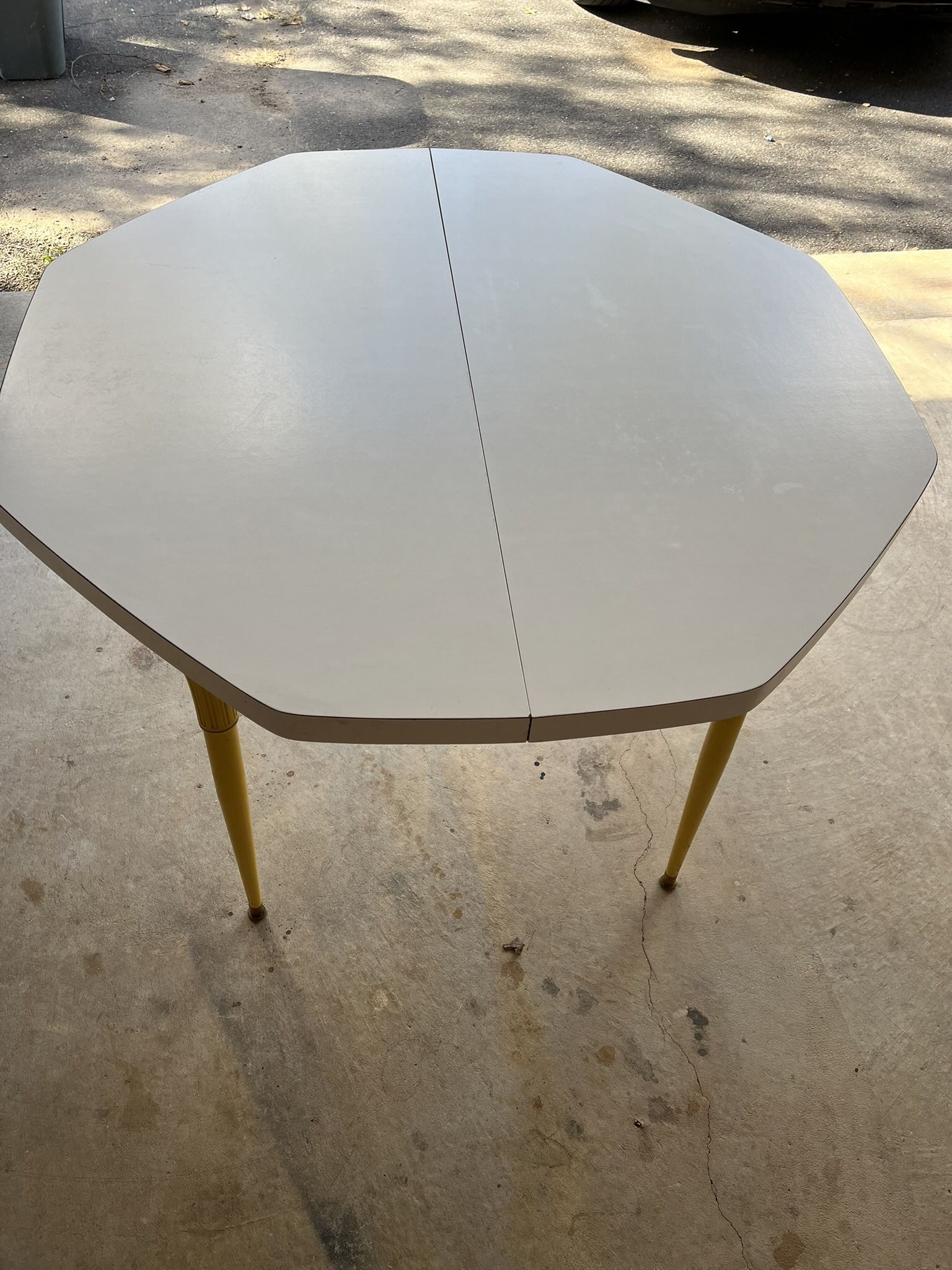 White Table has 1 Leaf and Sunshine Yellow Legs