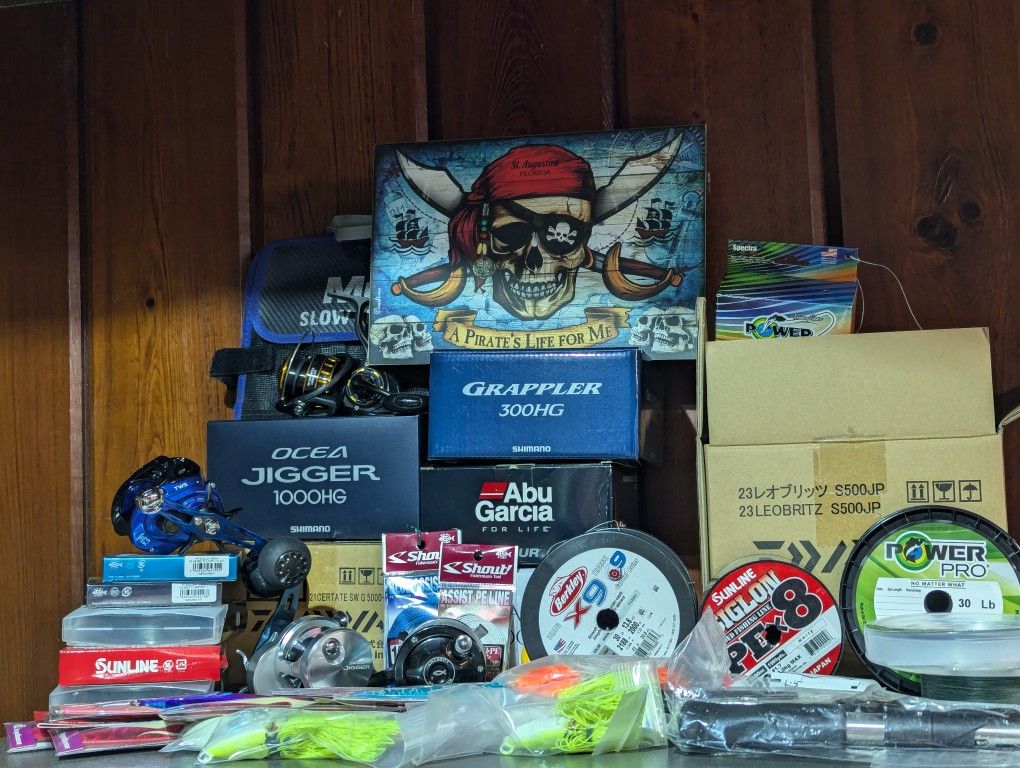Lots Of Fishing Reels, Braid, And Slow Pitch Jigs