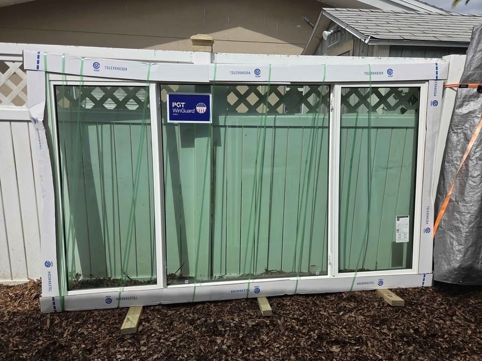 I Have 3 Brand New 105"W x 61"H PGT Impact Sliding Windows.