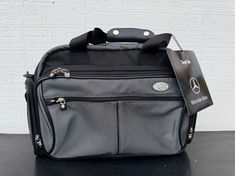 Mercedes-Benz small gray and black travel tote bag with multiple zippered compartments (new with tags).
