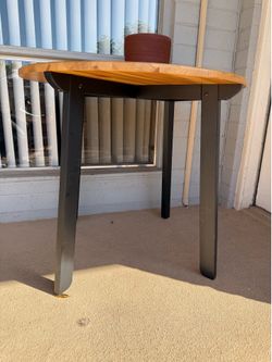 Round wooden dining table
