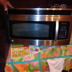 General Elecrity Wall Mounty Microwave And With Bracket To Go On wall.