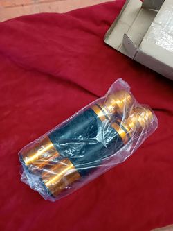 Motorcycle handlebar grips with bar end sliders
