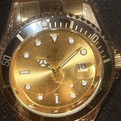 Gold/ Black Rim Watch